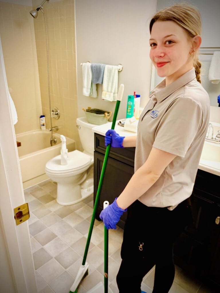 Triple H Cleaning Tech cleaning bathroom